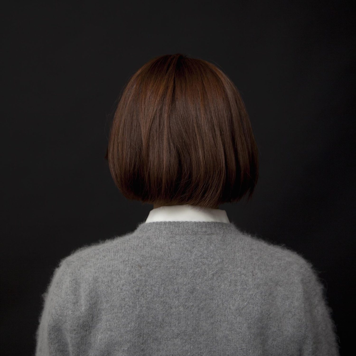 mujer en peluqueria corte de pelo bob